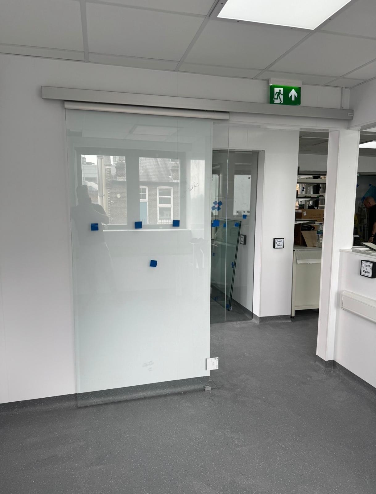 Internal automatic sliding glass door in a clinical treatment area