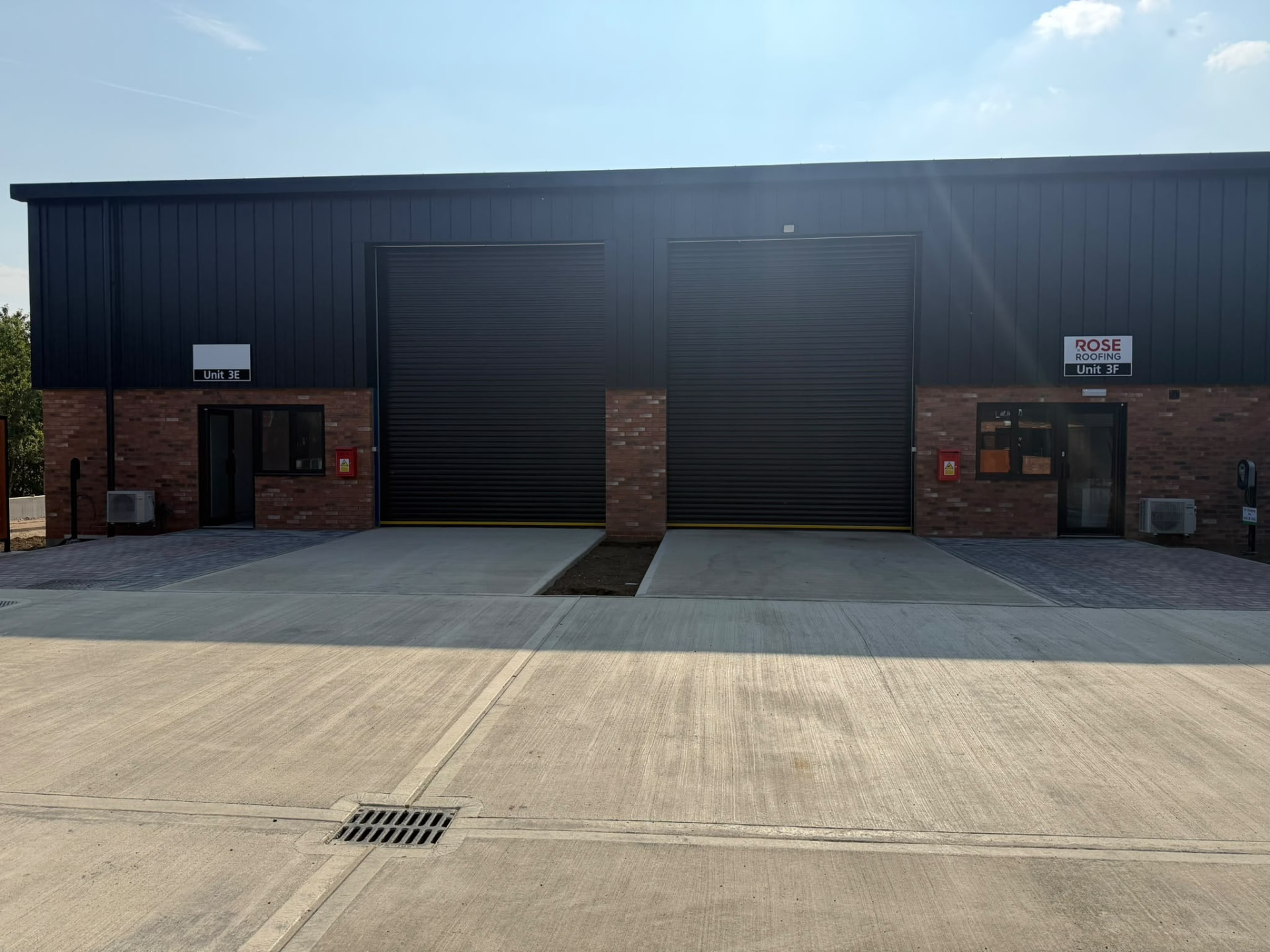Industrial steel roller shutter doors installed on a commercial warehouse unit