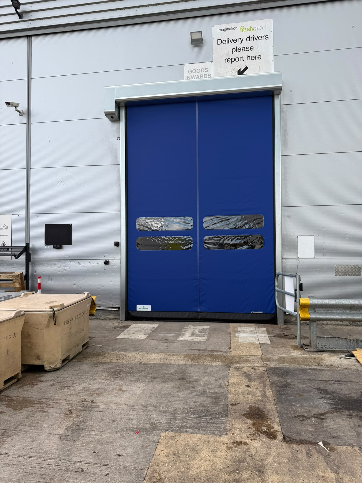 Blue high speed door at a goods inward loading bay