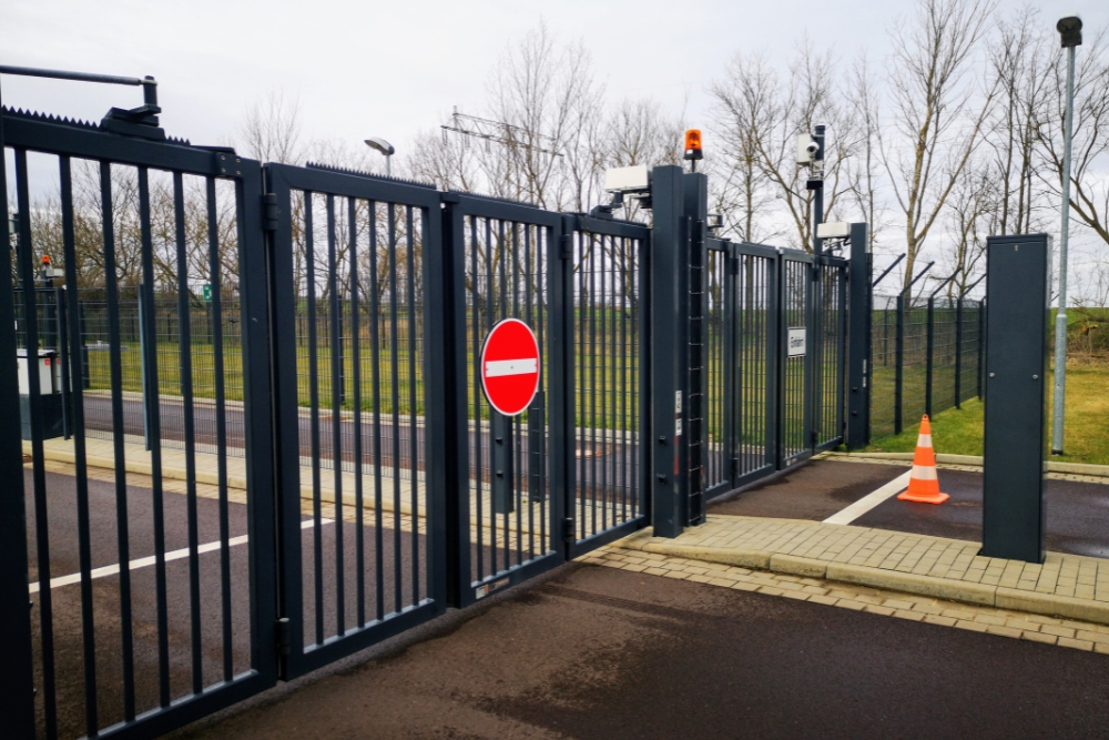 Automated sliding security gate installed at a commercial site entrance